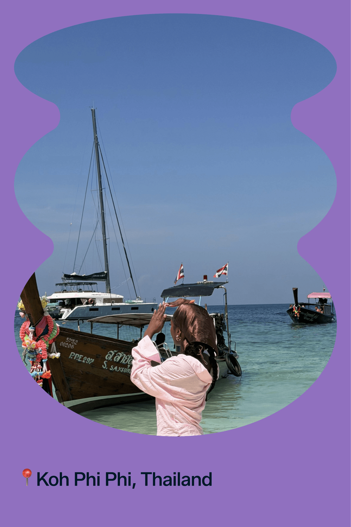 Me photographing longtail boats moored off Koh Phi Phi, Thailand, framed as a Pinterest pin.